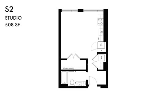 A floor plan of a studio apartment with a kitchen area.